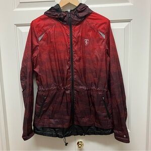 Scuderia Ferrari women’s allover print hooded long sleeve windbreaker, red/black